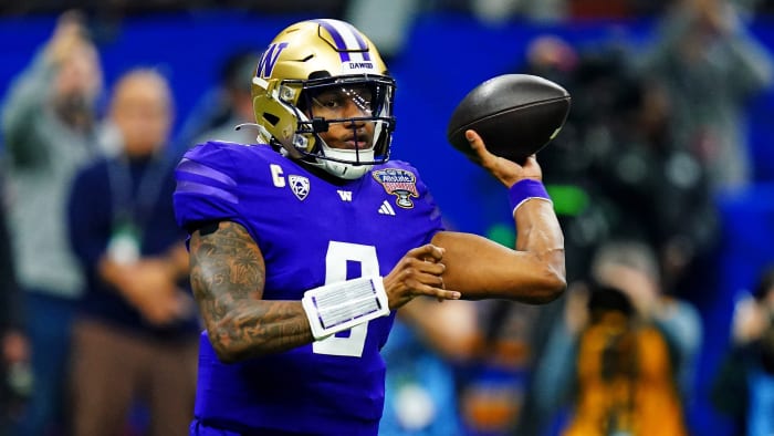 Washington Huskies quarterback Michael Penix Jr. throws the football against the Texas Longhorns in the Sugar Bowl.